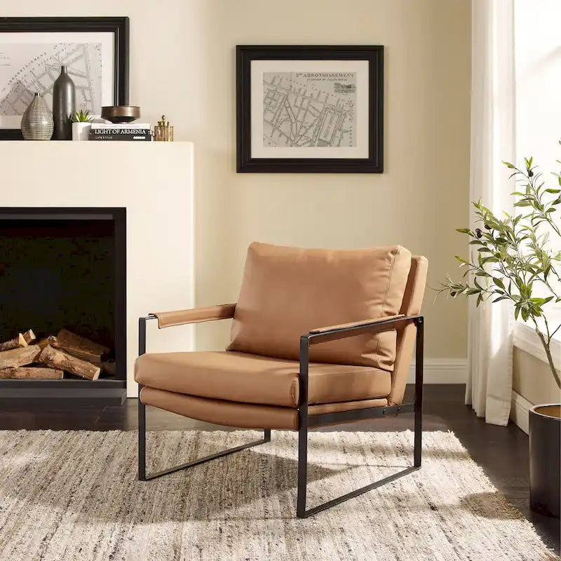 Moderne fauteuil in imitatieleer uit het midden van de vorige eeuw met stalen frame