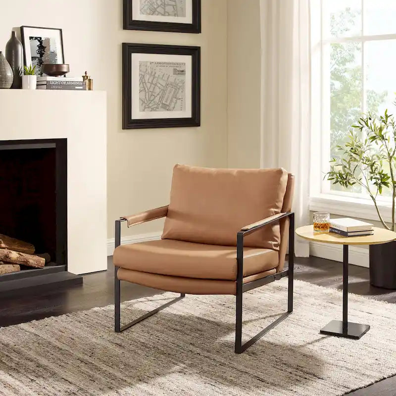 Moderne fauteuil in imitatieleer uit het midden van de vorige eeuw met stalen frame