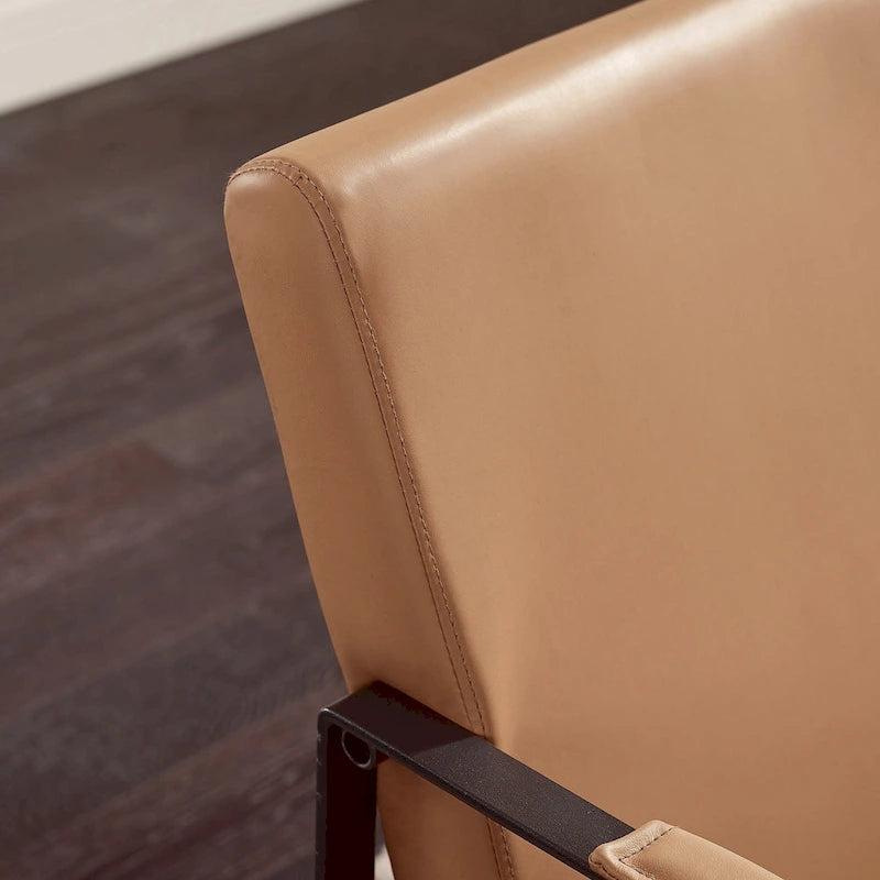 Moderne fauteuil in imitatieleer uit het midden van de vorige eeuw met stalen frame