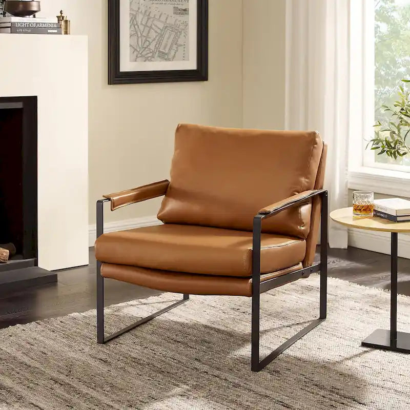 Moderne fauteuil in imitatieleer uit het midden van de vorige eeuw met stalen frame