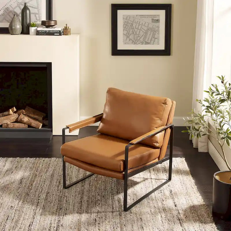Moderne fauteuil in imitatieleer uit het midden van de vorige eeuw met stalen frame